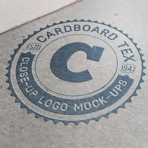 Free Closeup Silver Emboss Logo Mockup (PSD)