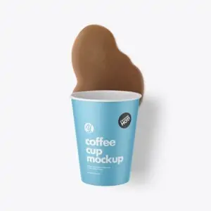 Free Paper Coffee Cup w/ Spilled Latte Mockup (PSD)